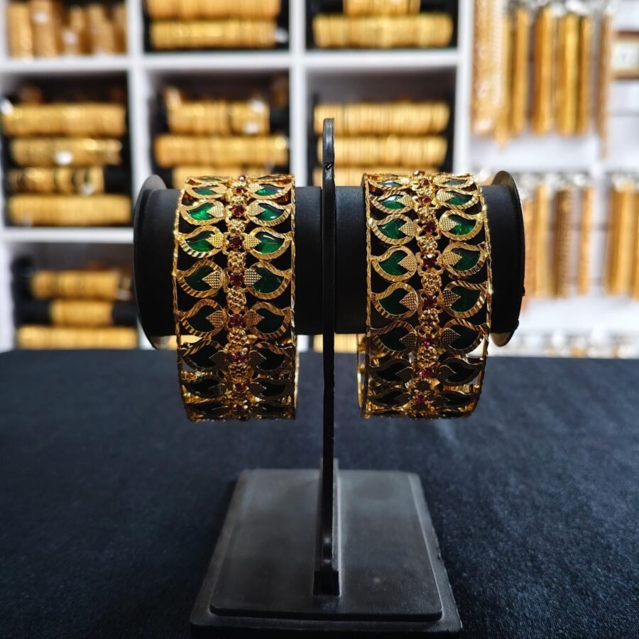 Gold plated mango palakka bangles with special works