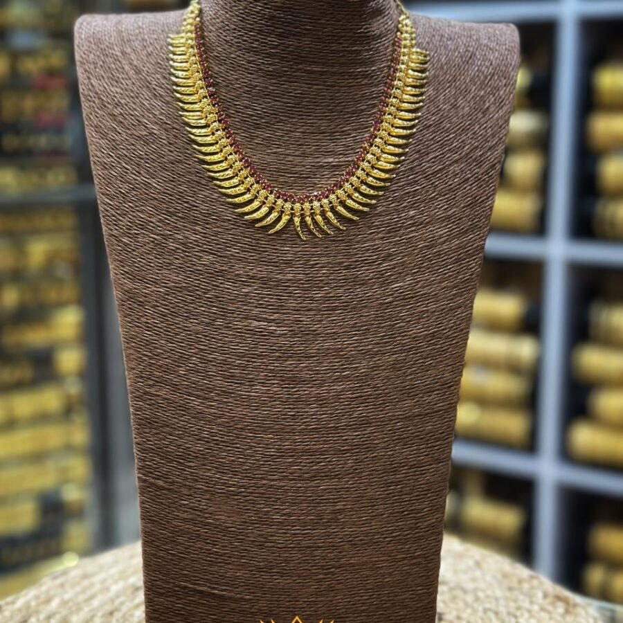 Gold plated pulinakham shaped short haram with Ruby stones(00156)